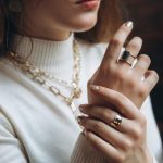 Woman’s,Hands,Close,Up,Wearing,Rings,And,Necklace,Modern,Accessories